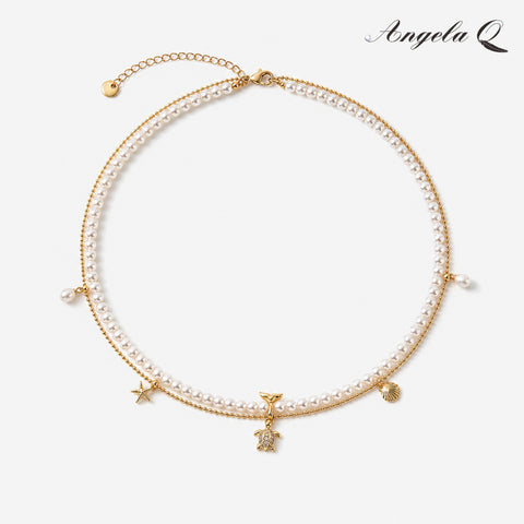 MALIBU CROSS - LAYERED PEARL NECKLACE