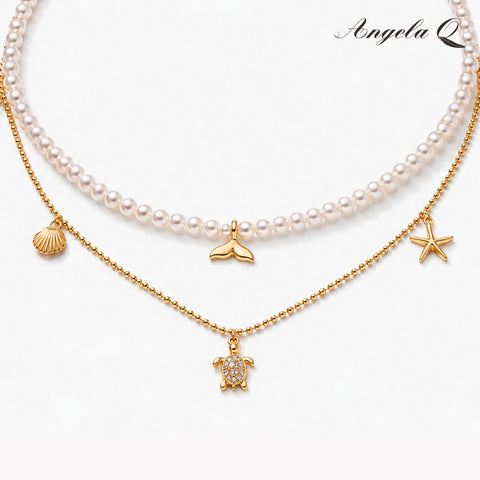 MALIBU CROSS - LAYERED PEARL NECKLACE